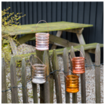 Rustieke glazen windlichten – sfeervolle tuindecoratie